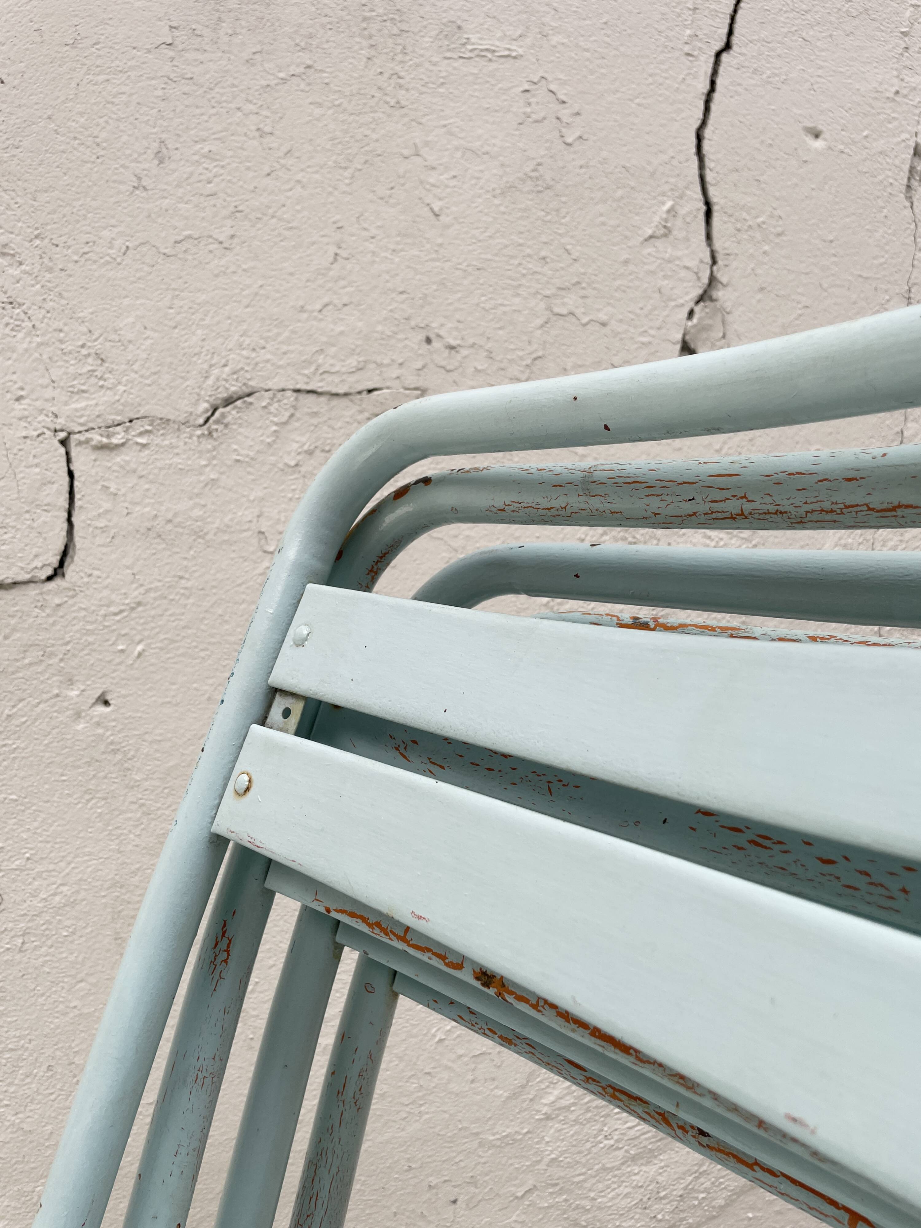 Set of four Tolix T2 chairs, circa 1950.