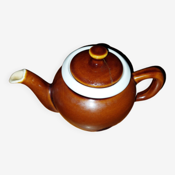 Old used ceramic teapot