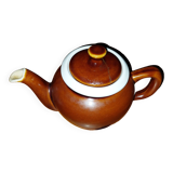 Old used ceramic teapot