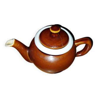 Old used ceramic teapot