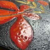 Side table or end of sofa in wrought iron and enamelled lava stone circa 1960