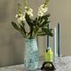 Blue speckled and marbled glass vase