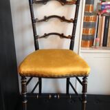 Paire de chaises noir et or