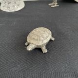 Ancient tortoise in silver metal