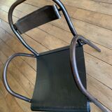 Industrial chair with rounded armrest spout