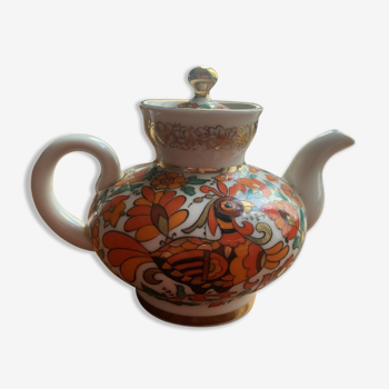 Individual russian porcelain teapot