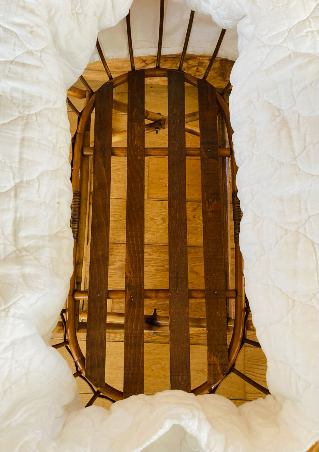 Bamboo, rattan, wicker cradle bassinet from the 1960s with a foldable support.