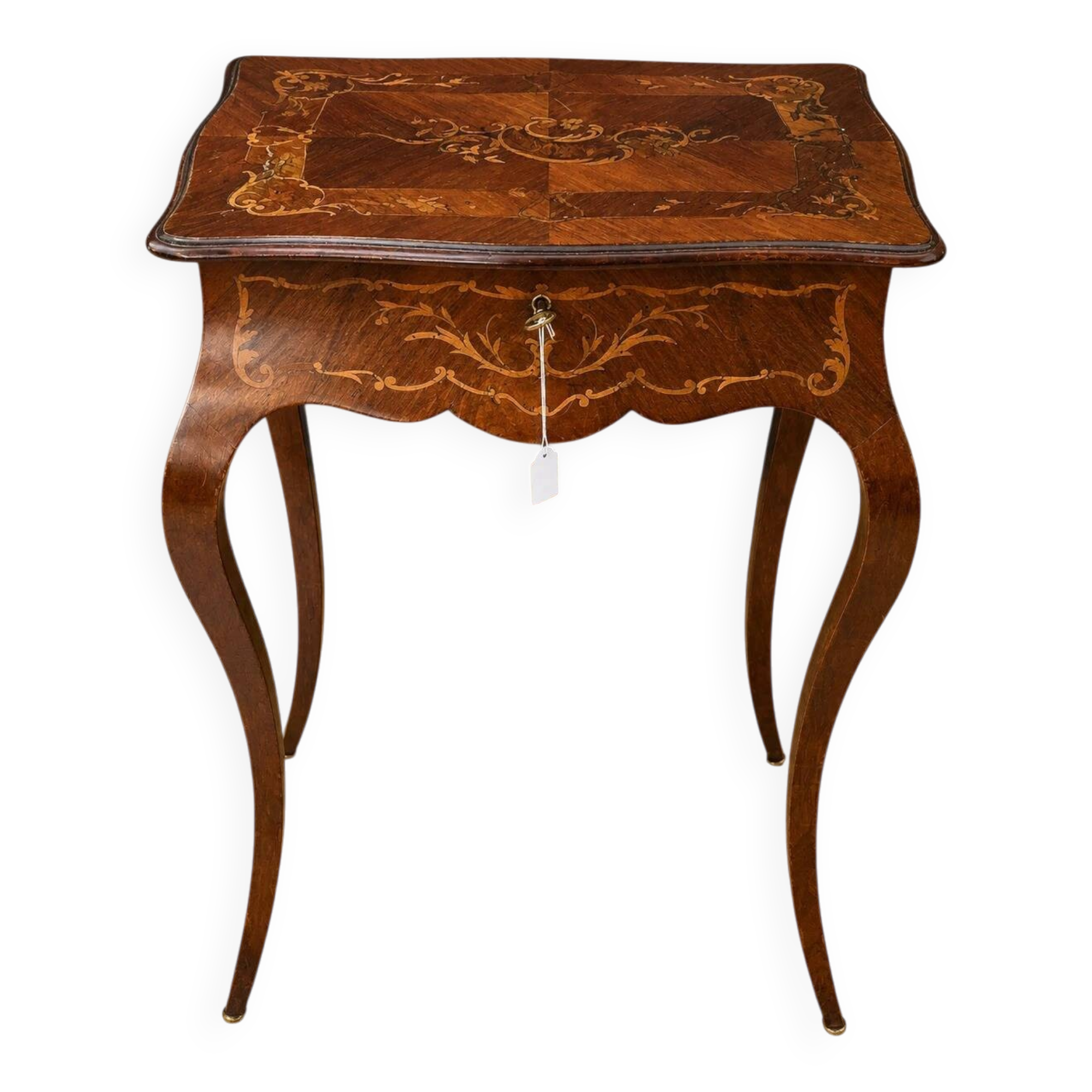 work table from the Napoleonic III era with marquetry of scrolls and patterns