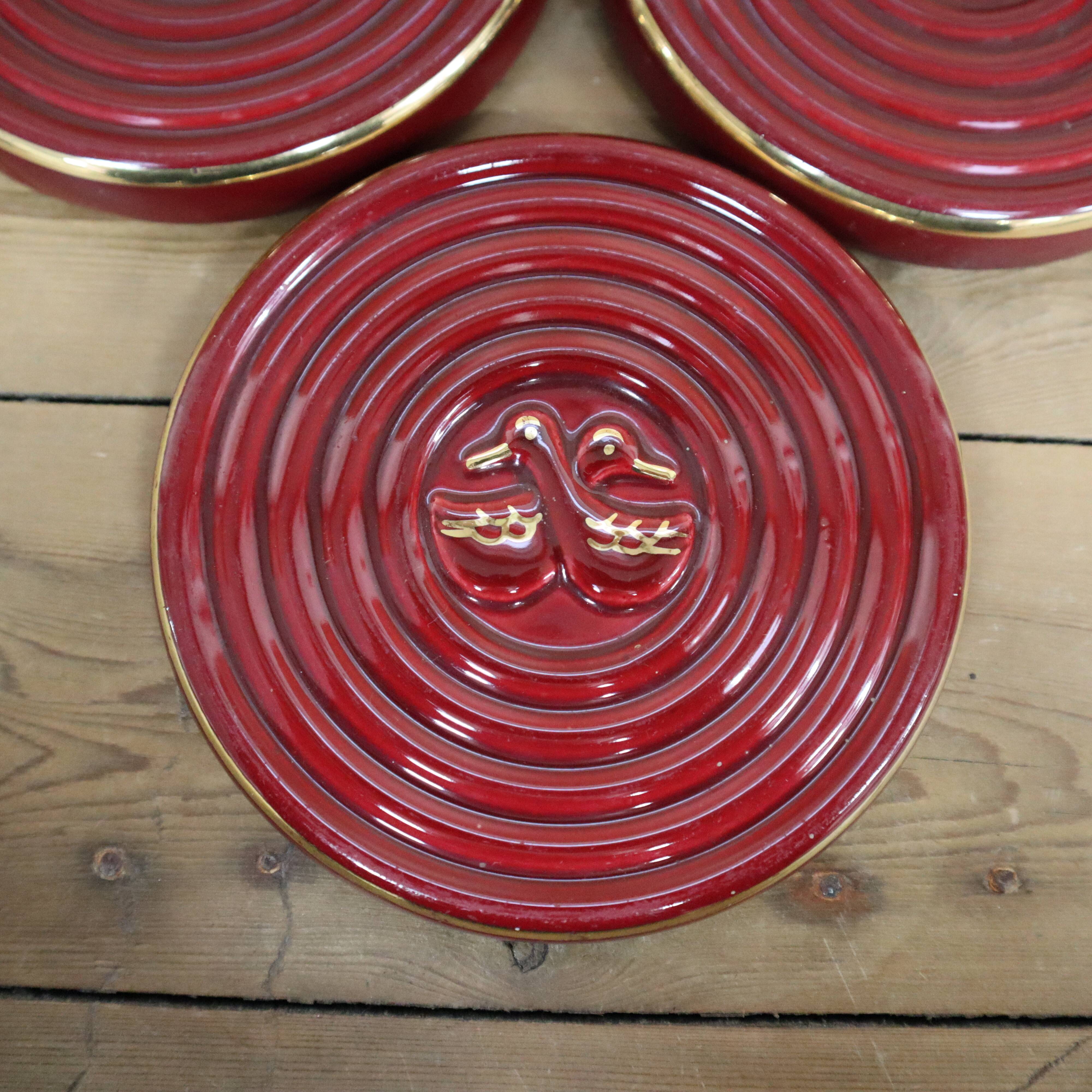3 small vintage burgundy duck coasters or glasses with gold edging