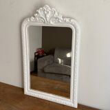 Late 19th century mirror with decorated pediment. 102x66.