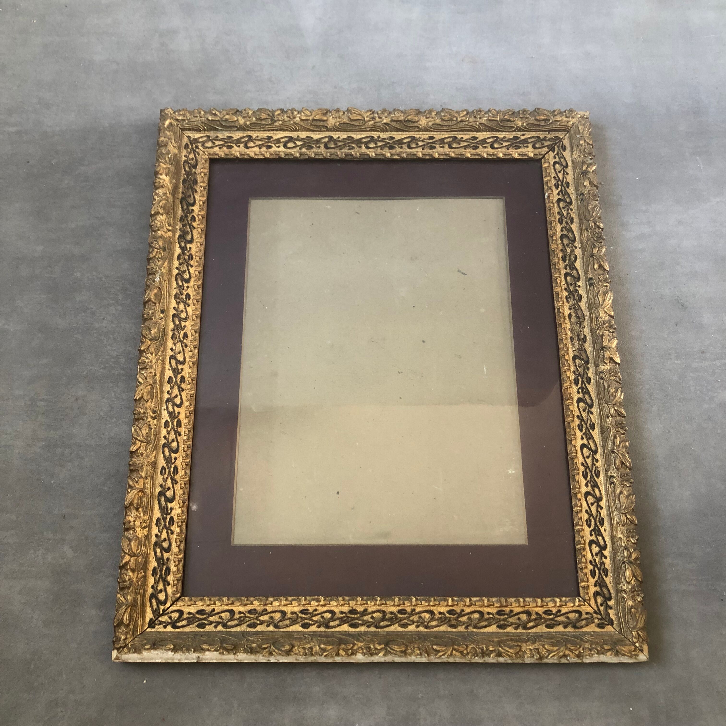 Old wooden frame and gilded stucco 50x60