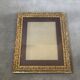 Old wooden frame and gilded stucco 50x60