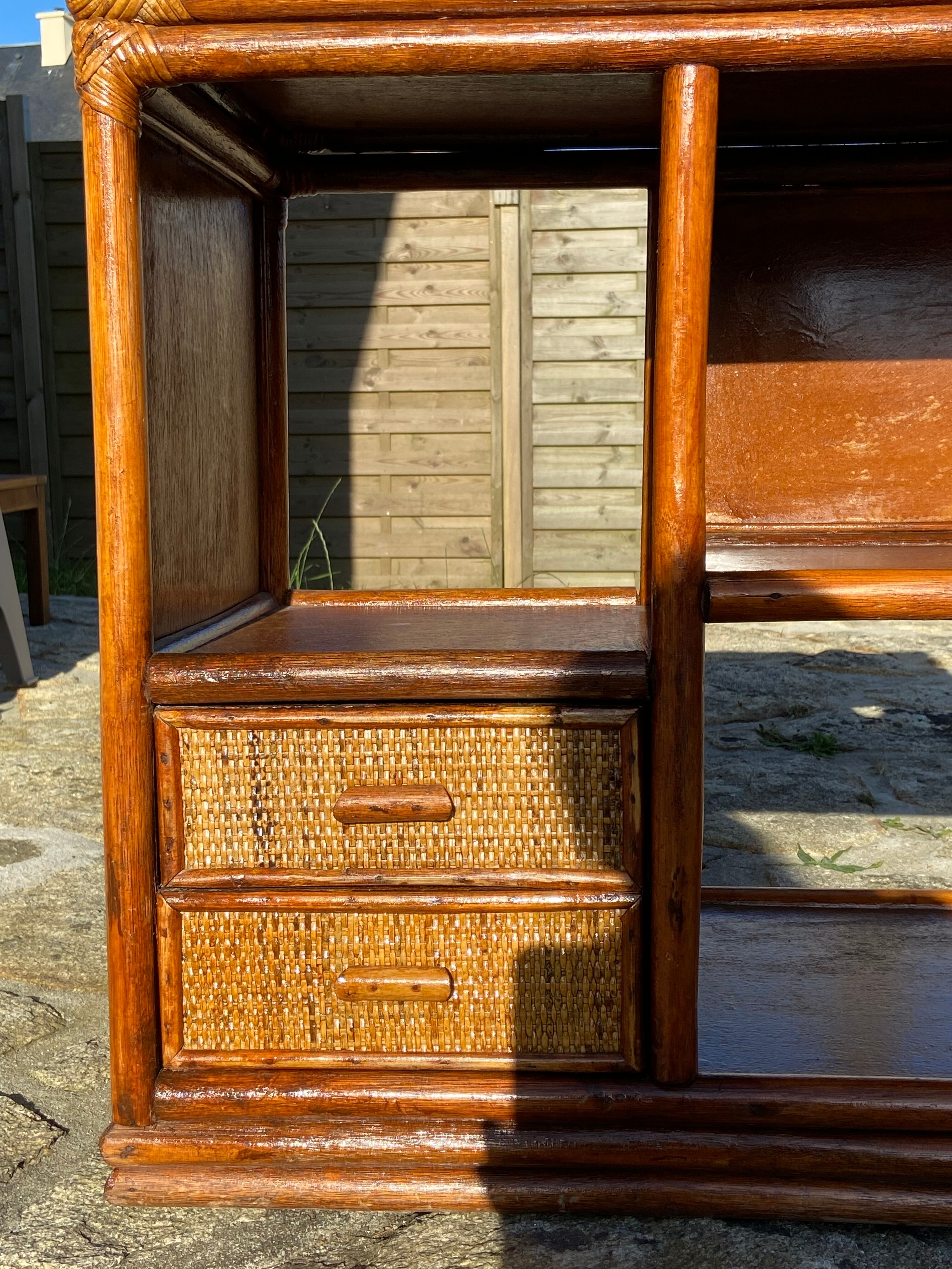 Wooden chest of drawers and rattan
