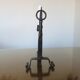 Brutalist candlestick in blackened wrought iron from the 1940s-50s.