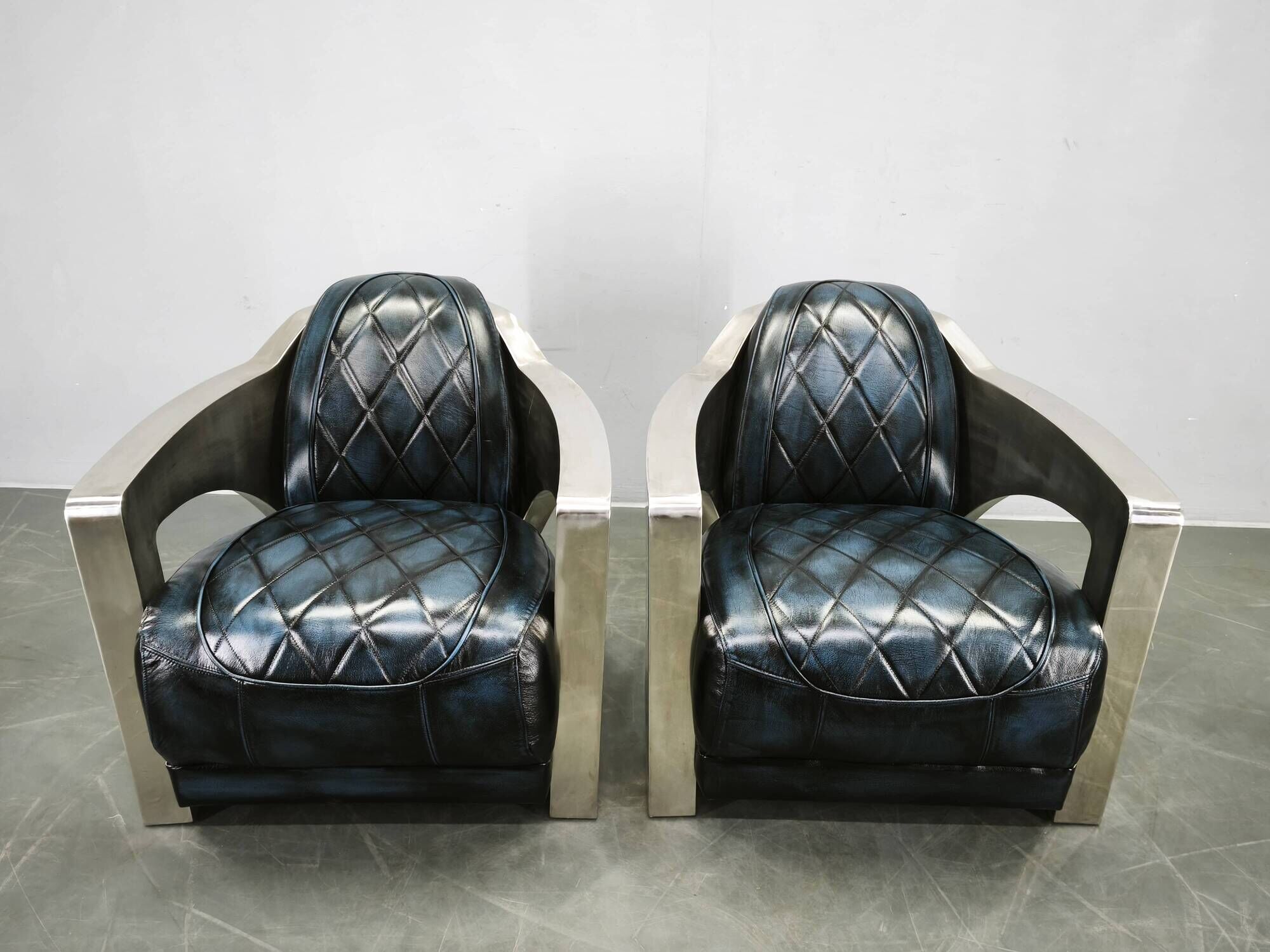 Pair of Timothy Oulton Aviator Leather and Steel Armchairs 1990s