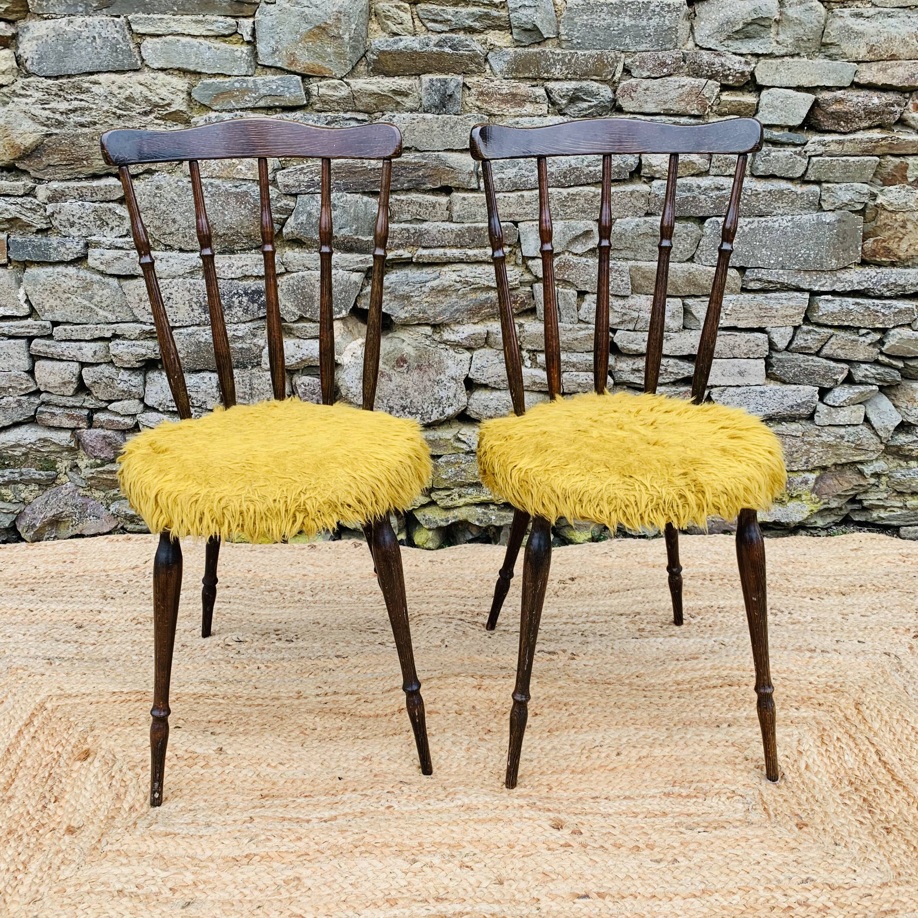 Pair of yellow moumoute chairs