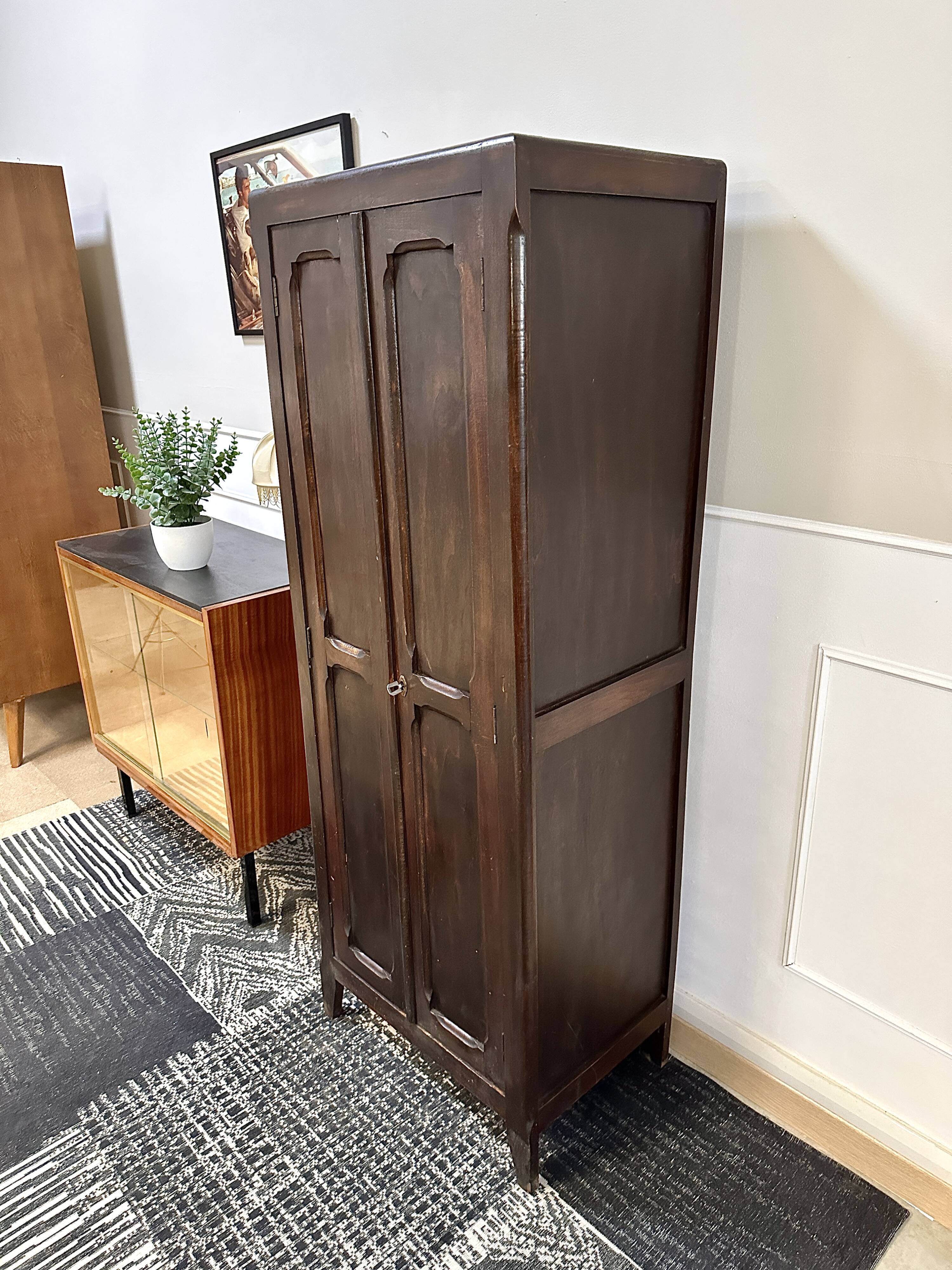 Parisian cabinet man standing