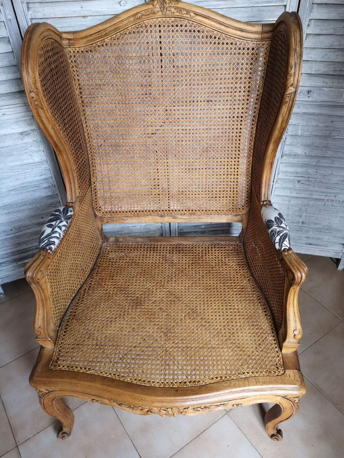 Antique wingback armchair