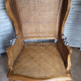 Antique wingback armchair