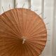 Powder pink paper umbrella and wooden handle