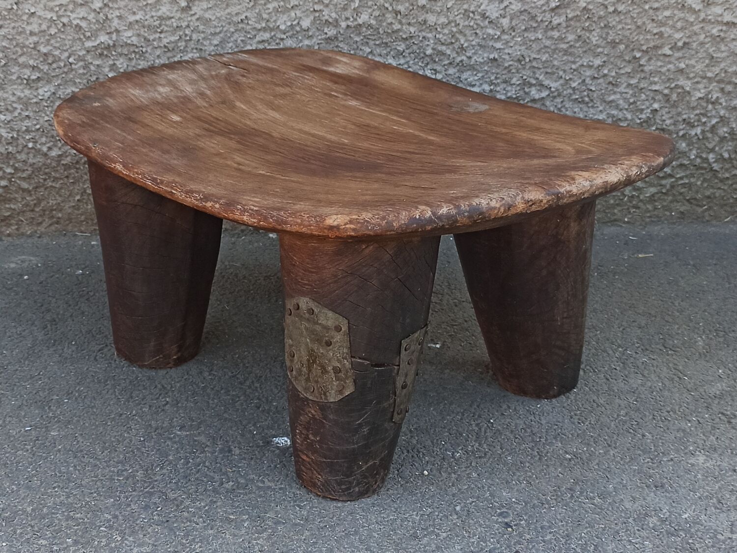 Antique wooden stool. Senufo African art from Côte d'Ivoire.
