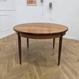 Round and extendable dining table published by G-Plan