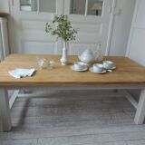 Coffee table made from a vintage farmhouse table in solid wood.