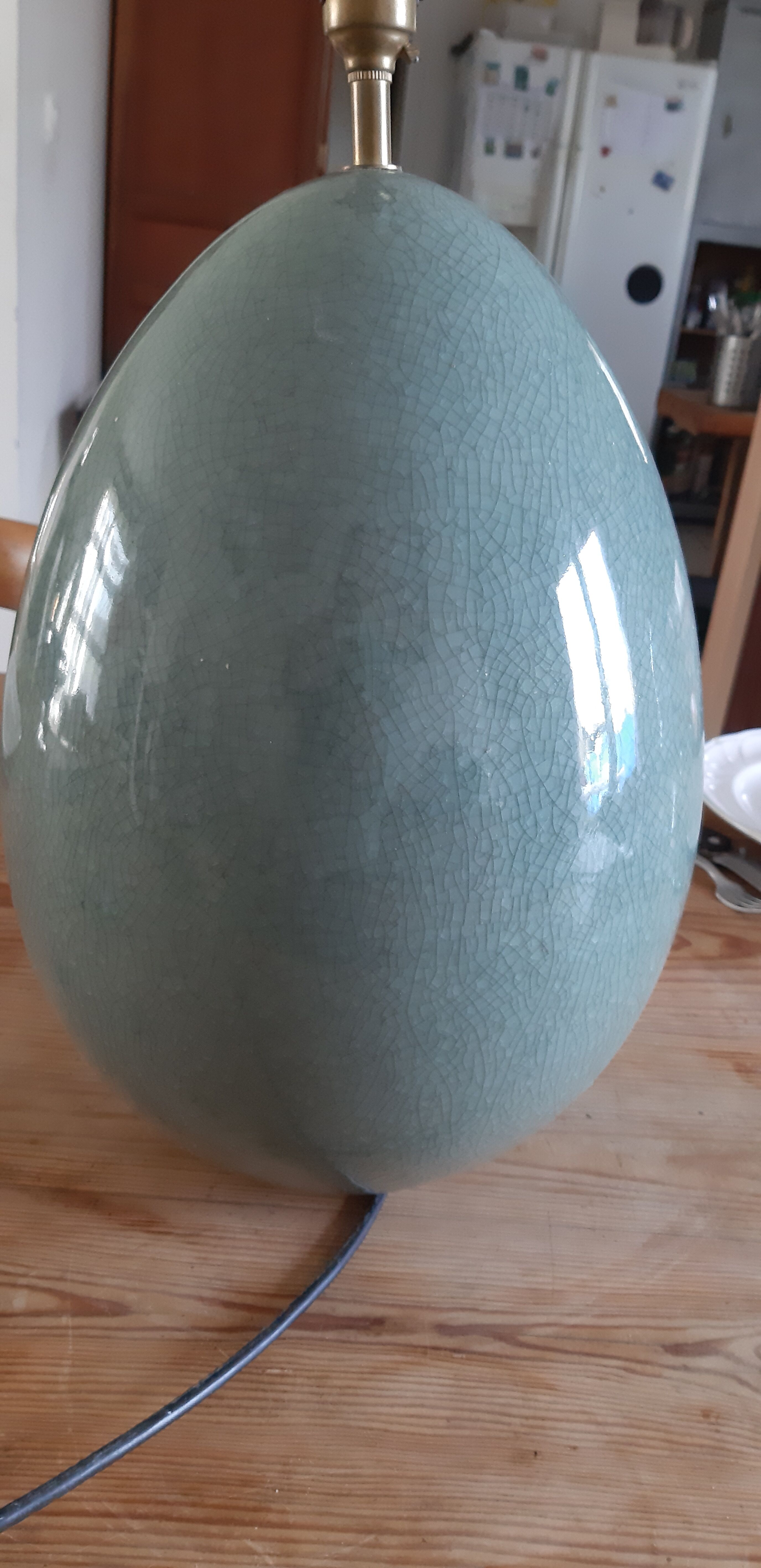 Celadon green cracked earthenware egg lamp foot