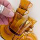 8 Duralex amber glass cups and saucers – France, 1970s