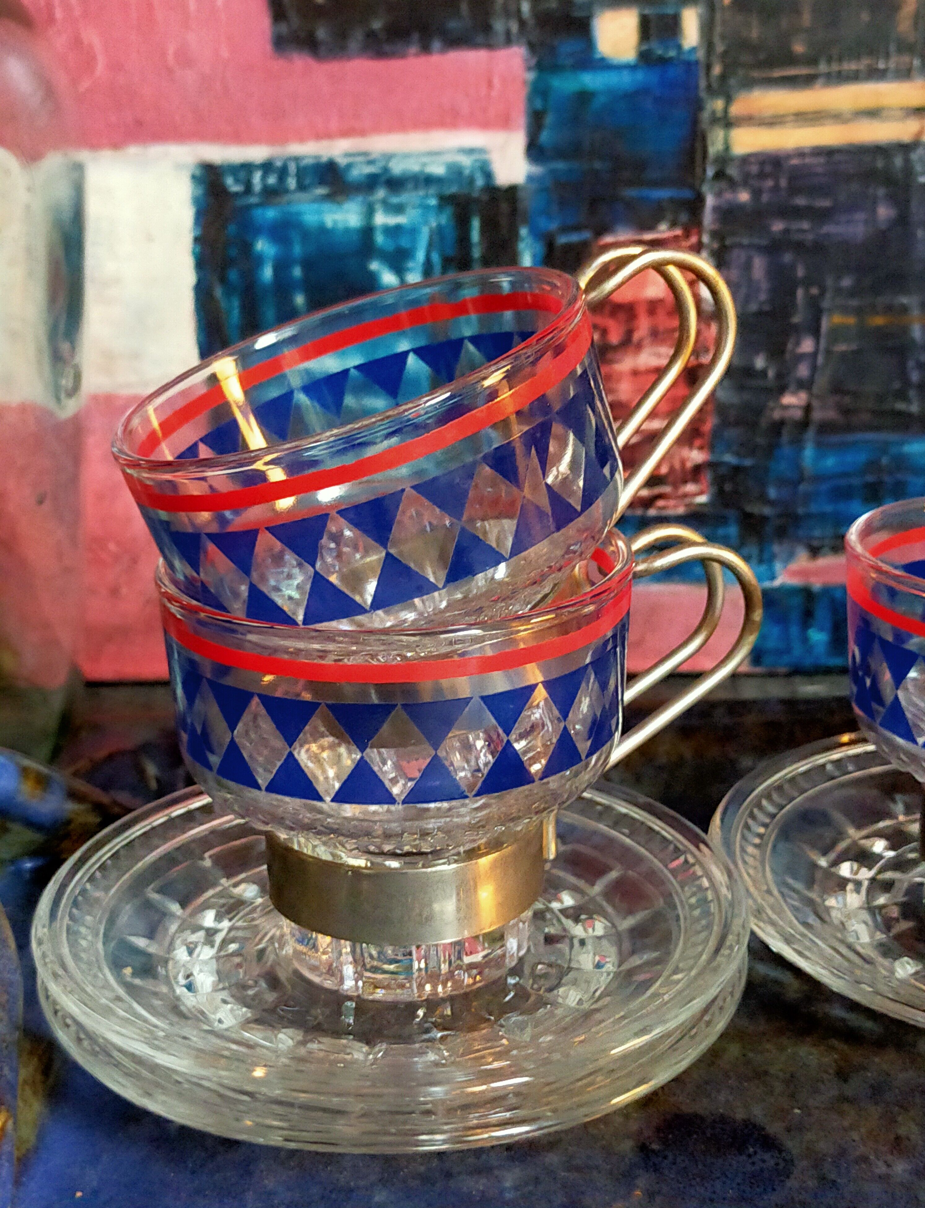 Four vintage coffee cups screen printed glass and metal