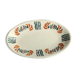 Dish out of ceramics decor orange and green