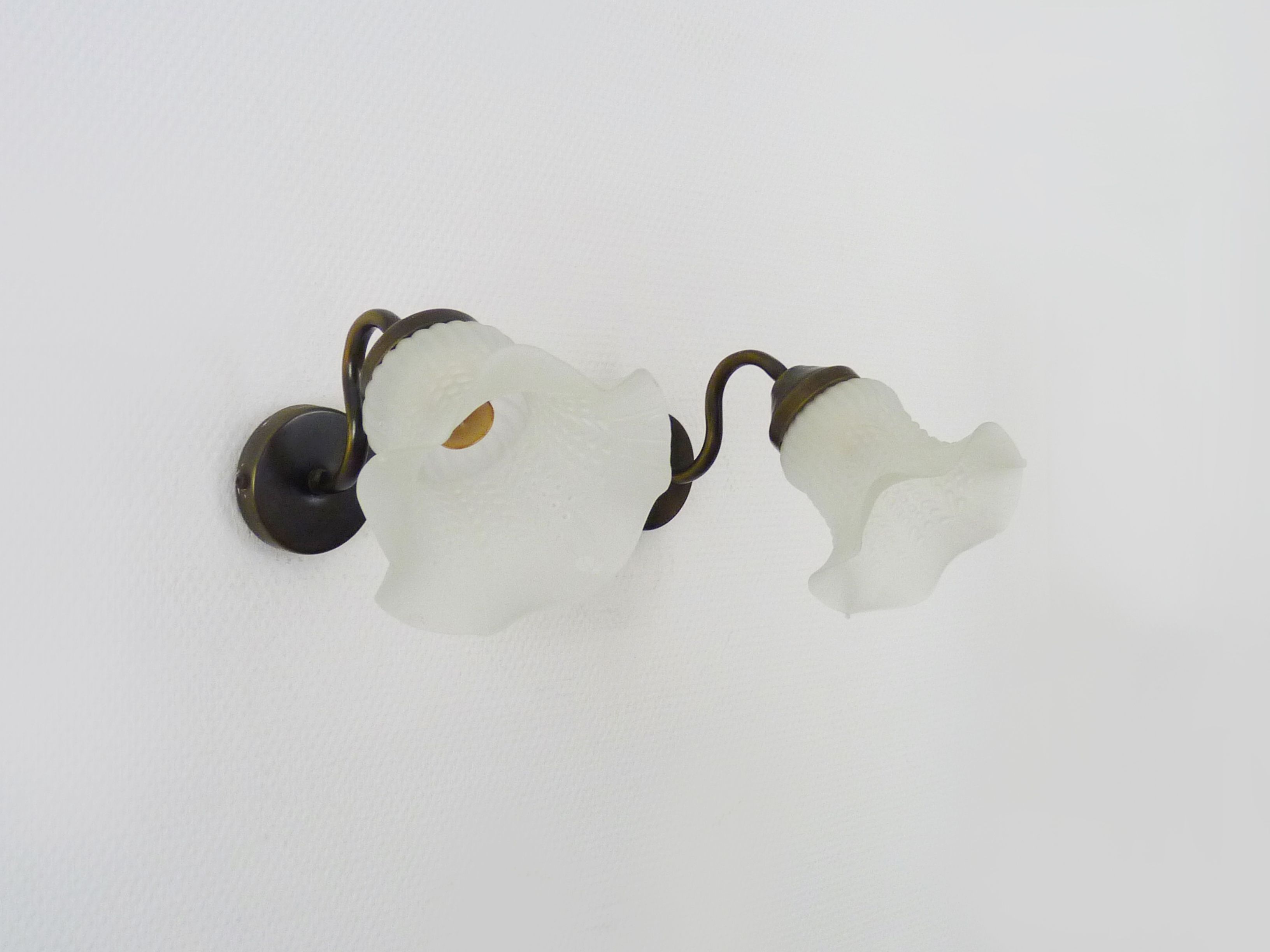 Pair of vintage brass gooseneck wall sconces and glass tulip. Year 60