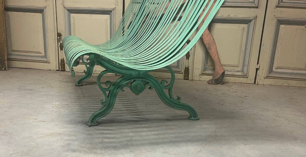 Garden bench in wrought iron and cast iron, late 19th century.