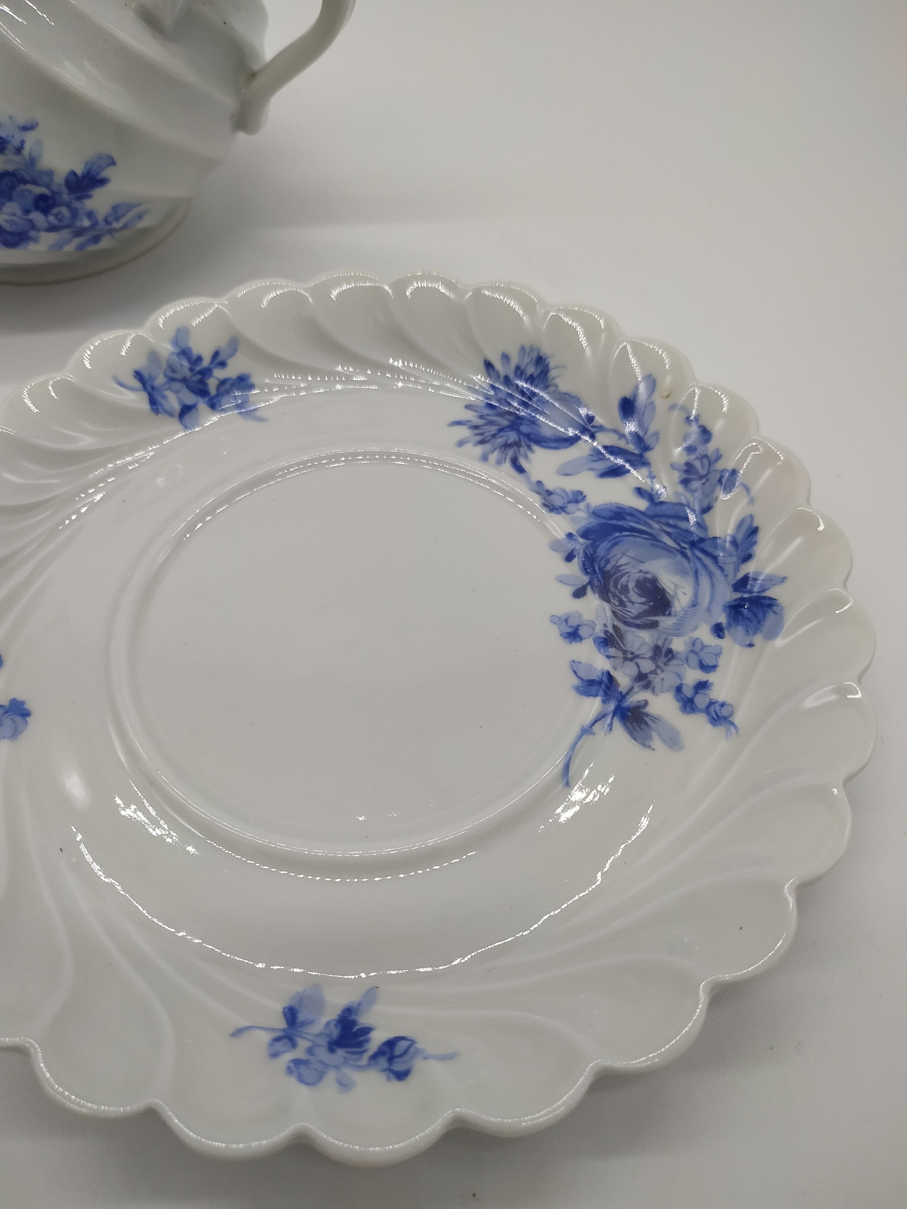 Haviland cup duo and its Limoges porcelain sugar bowl