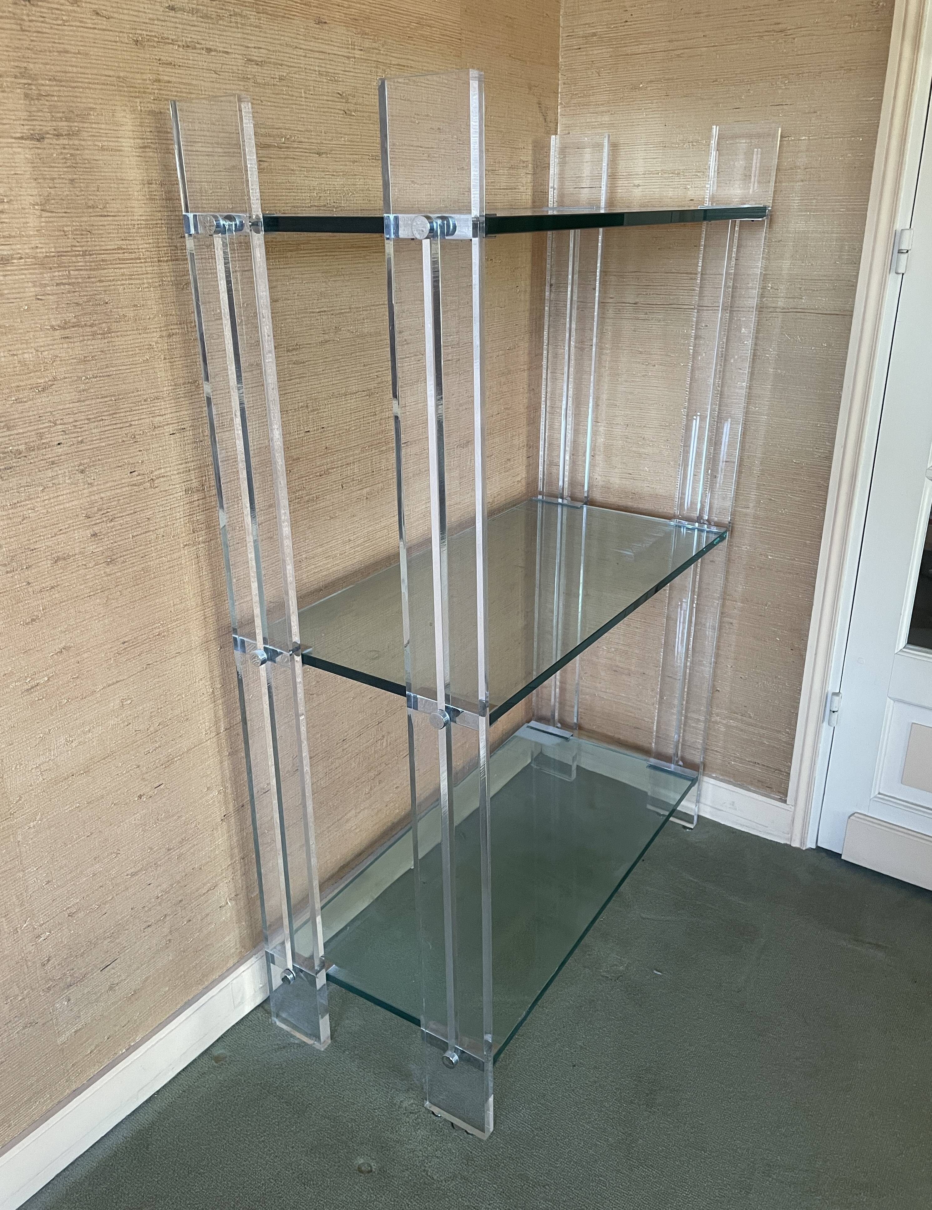 Shelf with 3 shelves in glass (shelves) and plexiglass (uprights) circa 1980.