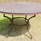 Garden table with wrought iron base