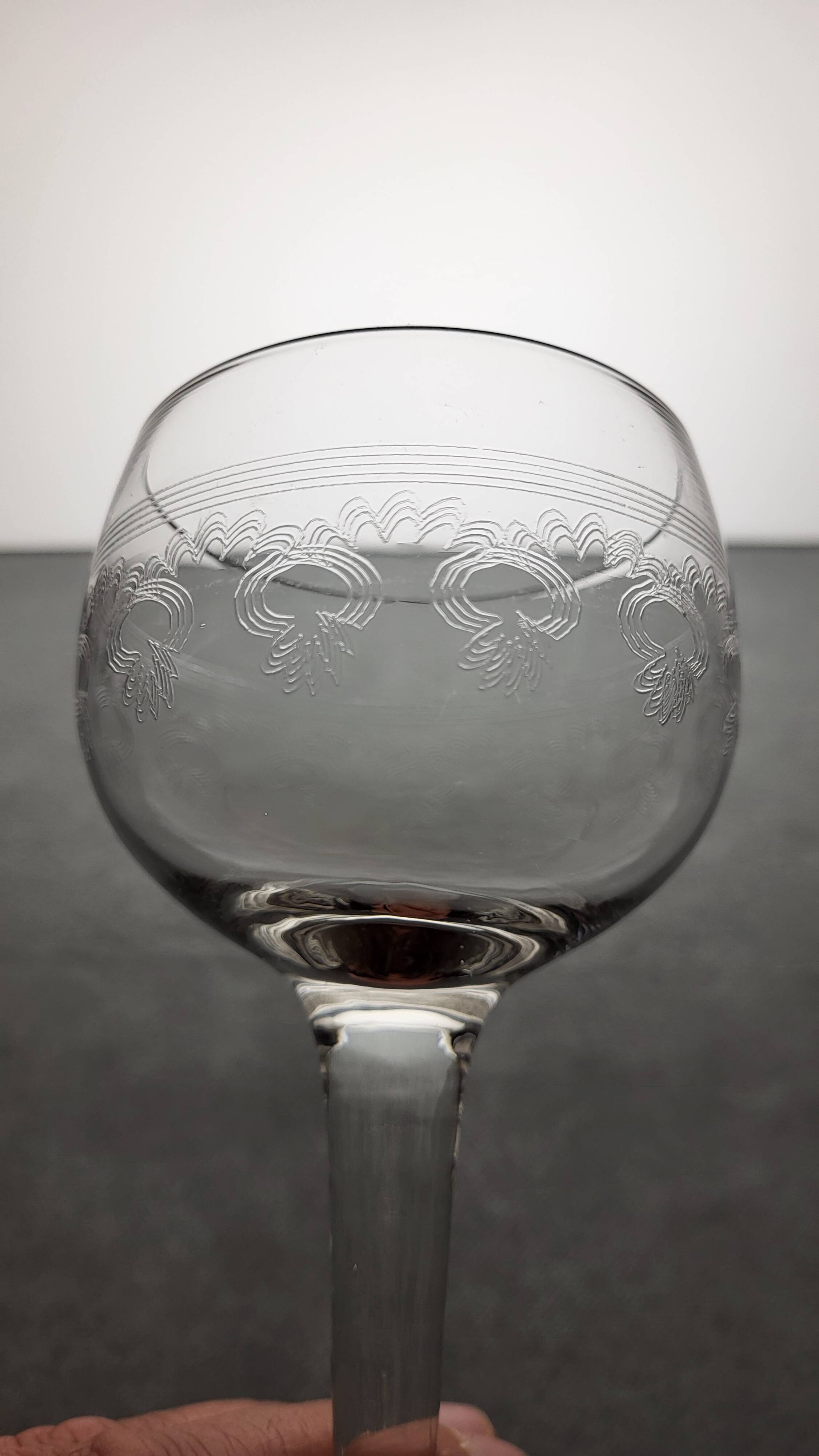 9 guilloche wine glasses, early 20th century