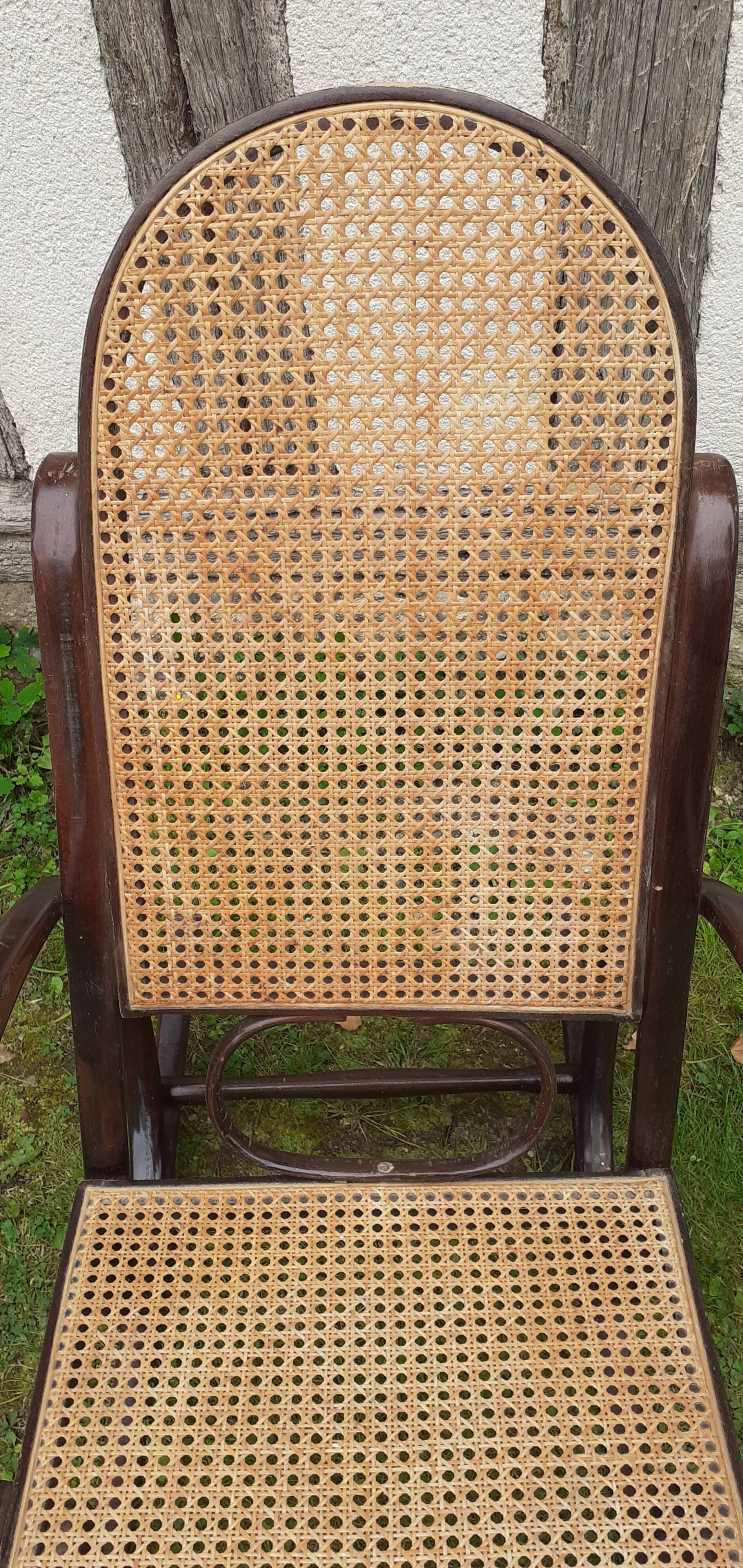 Rocking chair with vintage wood and canework