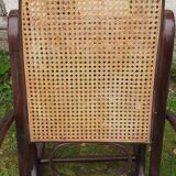 Rocking chair with vintage wood and canework