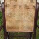 Rocking chair with vintage wood and canework