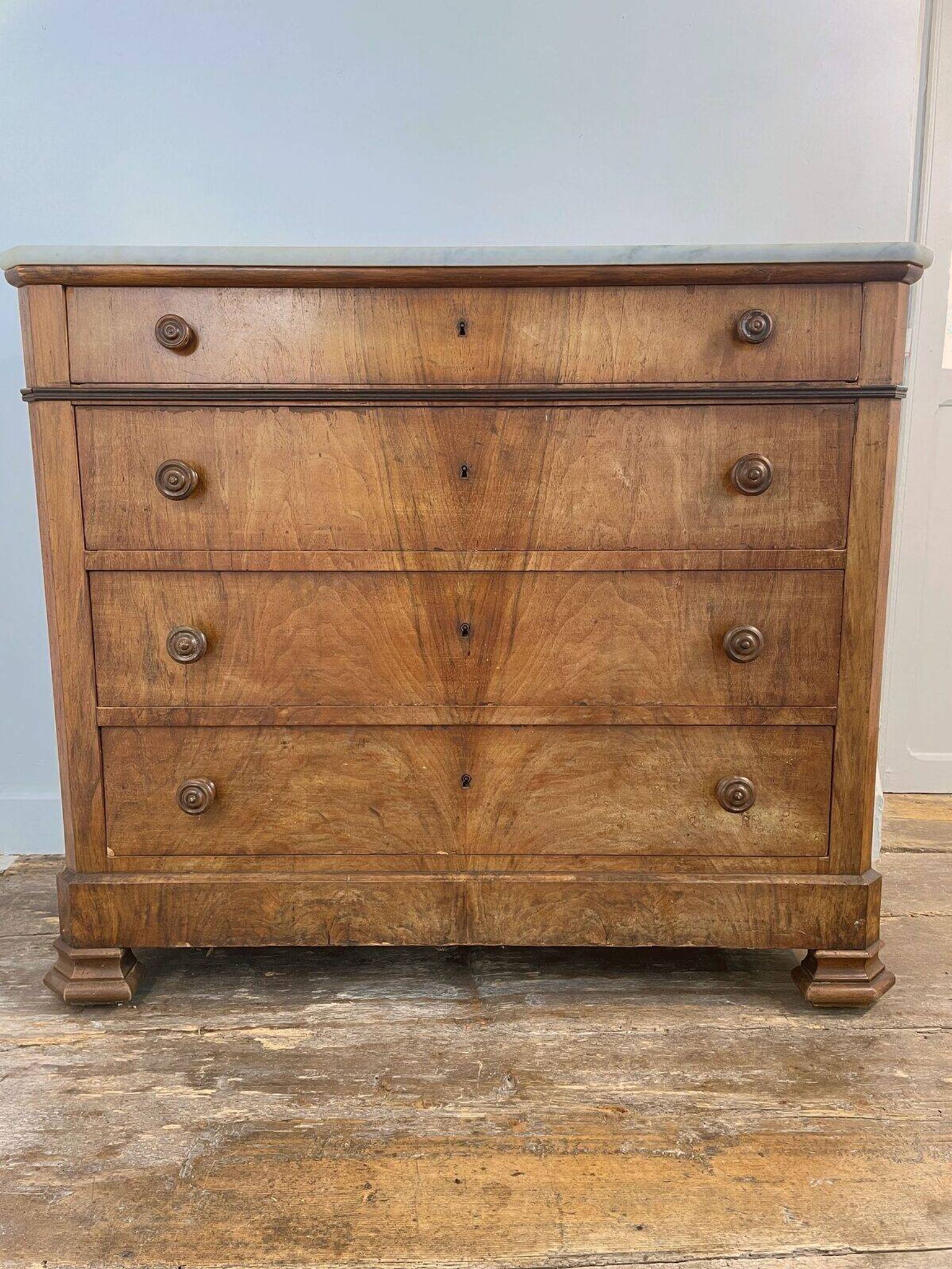 Antique walnut commode with marble top, 19th century.