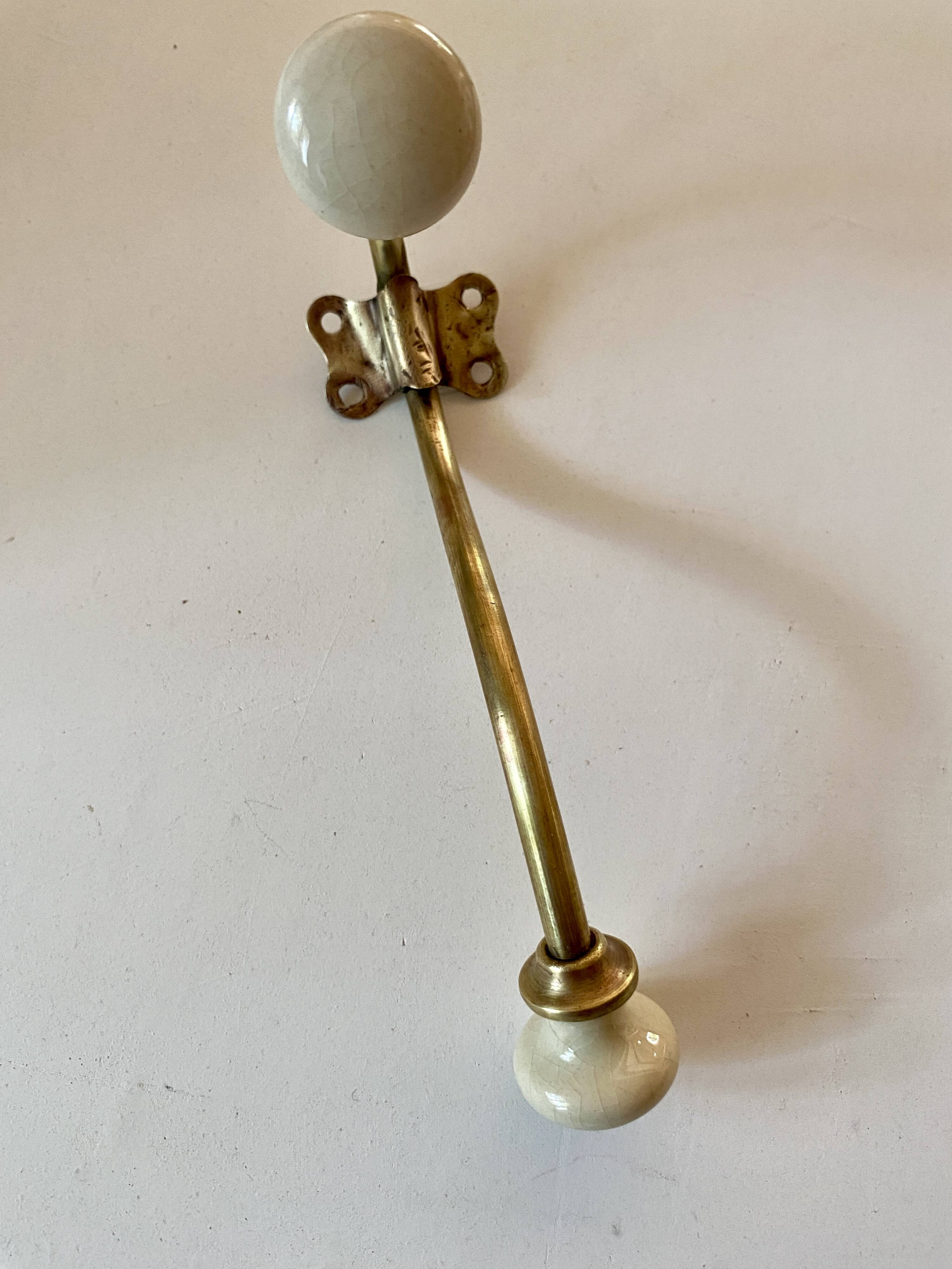 Double coat hook, brass and ceramic