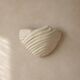 Shell-shaped ceramic applique handcrafted.