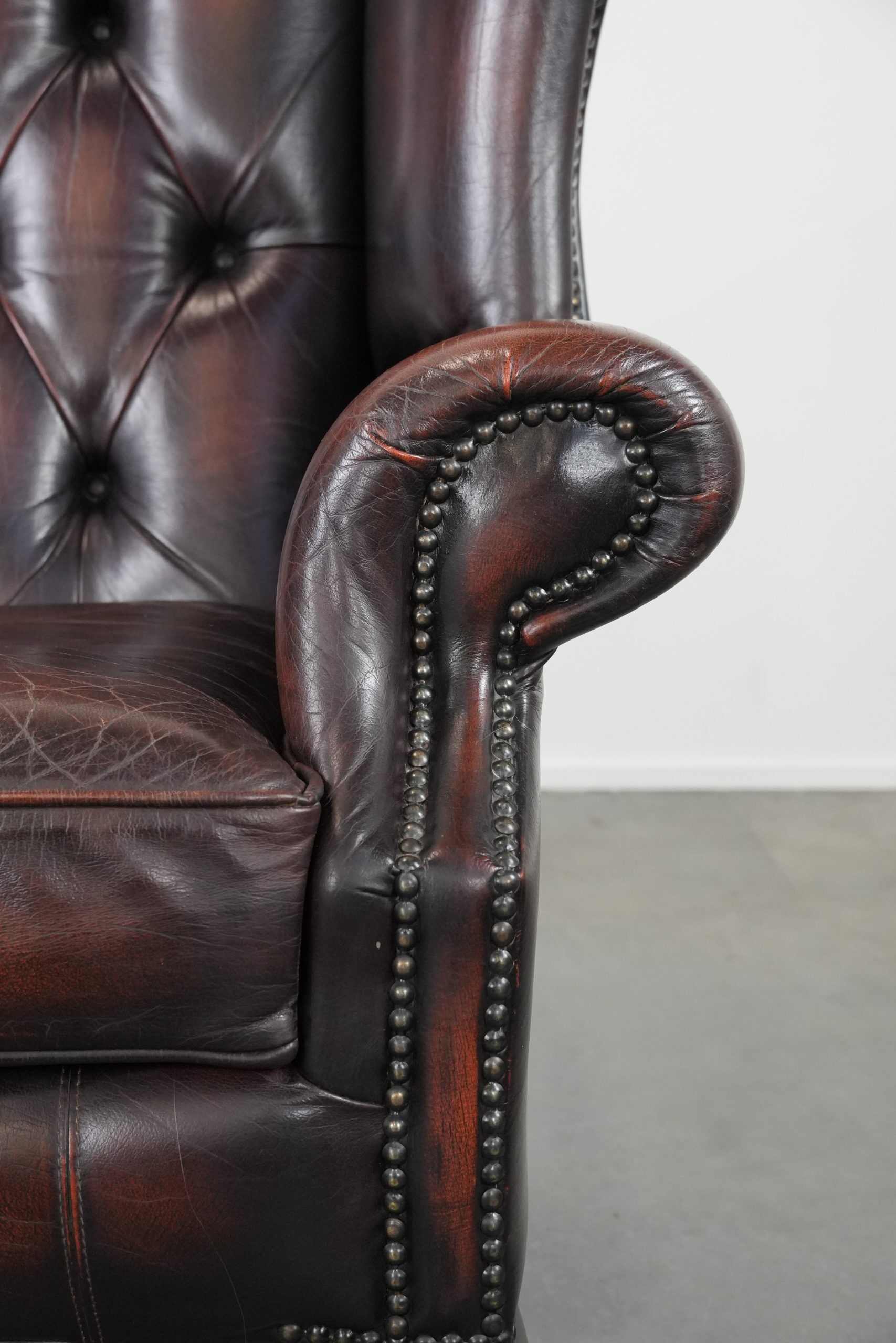 Cowhide leather Chesterfield wingback armchair in classic English style