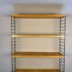 Floating wall shelf in oak veneer and black metal, 1960s