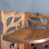 Old corner shelf in worked wood