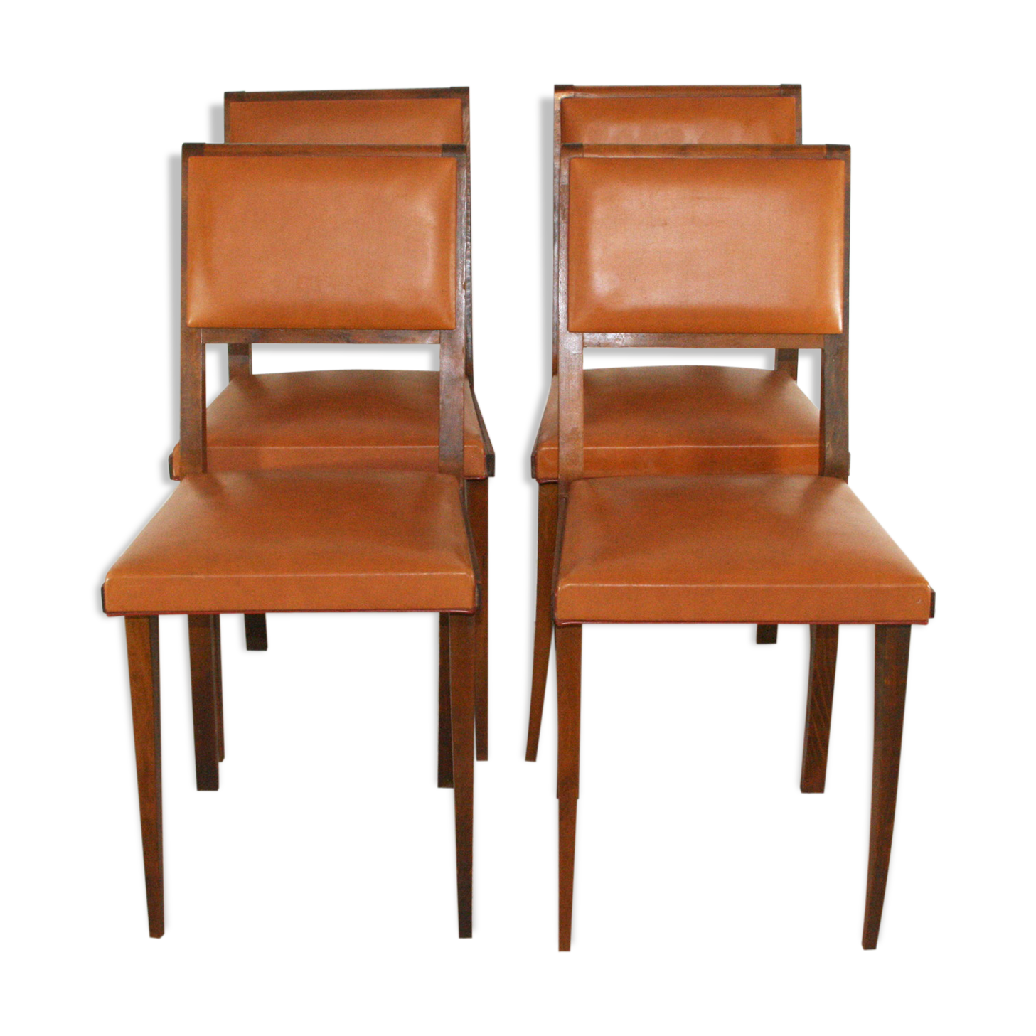 Set of four chairs in wood and leatherette