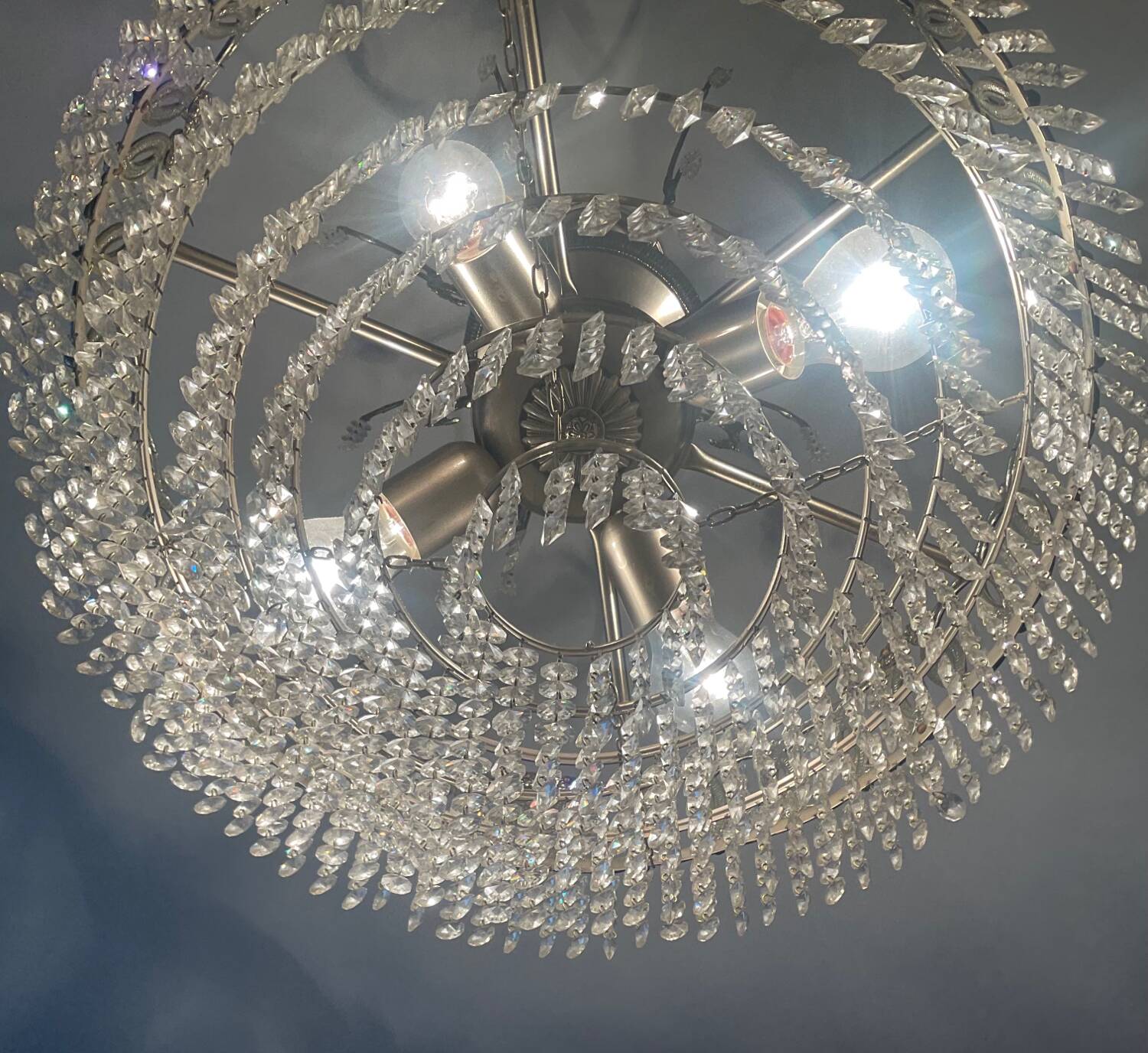 Cascading chandelier with crystal and silvered bronze pendants