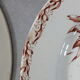 6 Dessert plates in Terre de Fer Lunéville (Tulips?)