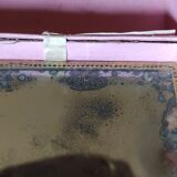 Old rectangular box has fixed under glass